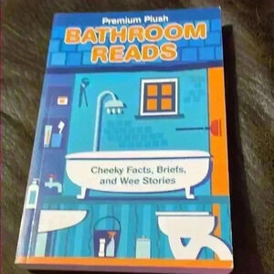 Bathroom reads book‎